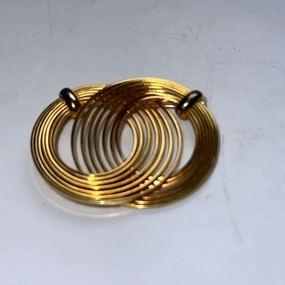 Vintage gold tone interlocking circles brooch/pin‎